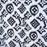 Flat lay presentation of Louis Vuitton cotton t-shirt with monogram-inspired silhouette