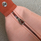  Sleek top-handle bag carried on shoulder 10