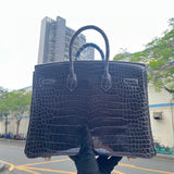 Side view of tailored structured handbag