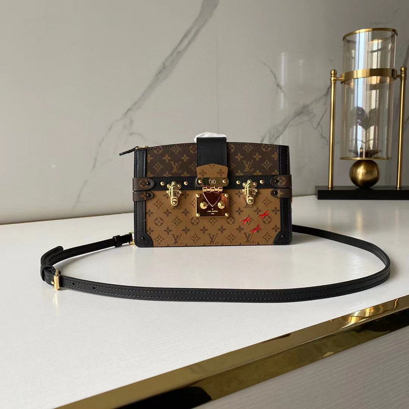 Front view of sleek structured women's handbag – women's statement bag