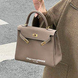 Side view of tailored structured handbag