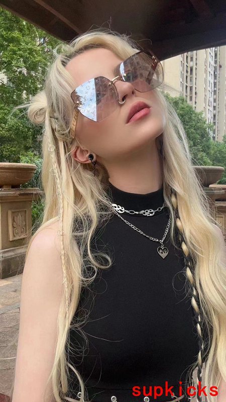 Close-up detail view of Louis Vuitton unisex sunglasses