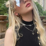 Close-up detail view of Louis Vuitton unisex sunglasses