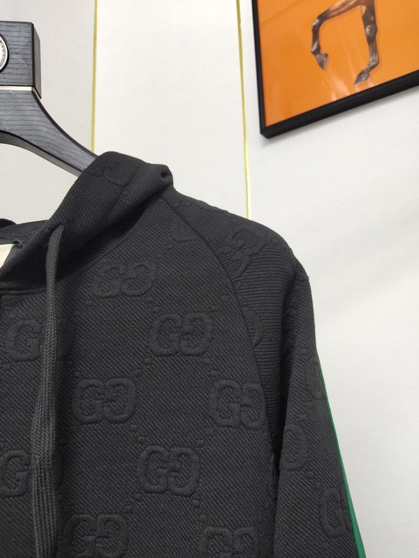 Side profile of Gucci luxury clothing with label-forward styling