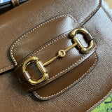 Back view of refined elevated women's handbag – women's luxury handbag