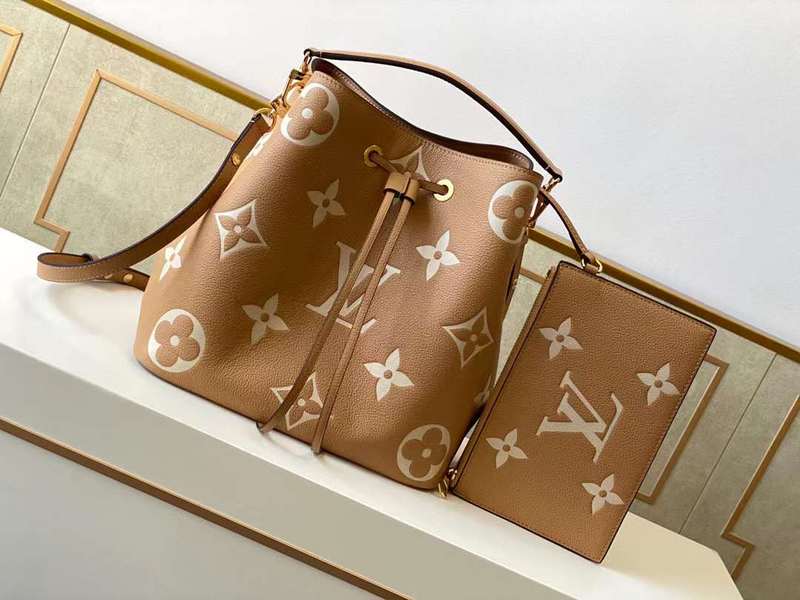 Side profile of modern structured women's handbag – women's luxury accessory