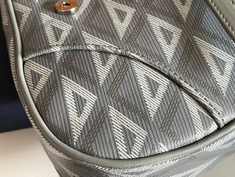 Styled lifestyle shot of sleek polished women's handbag – women's luxury accessory