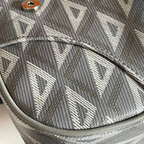Styled lifestyle shot of sleek polished women's handbag – women's luxury accessory