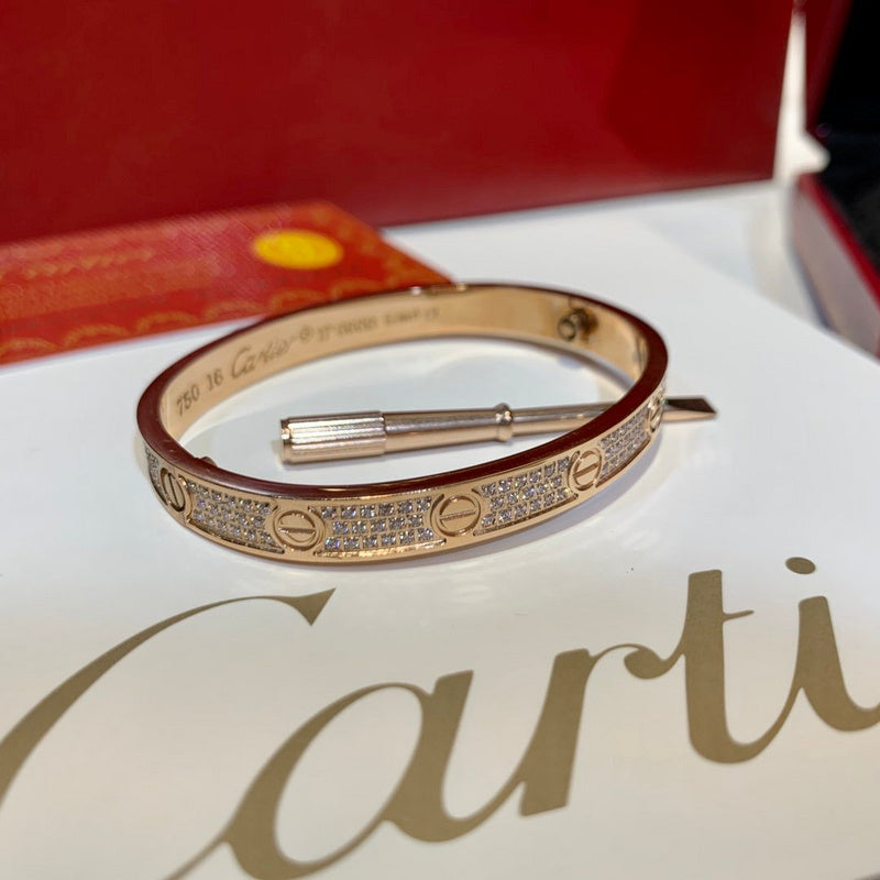 Close-up detail view of Cartier unisex jewelry piece