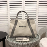 Front view of refined statement women's handbag – women's luxury accessory