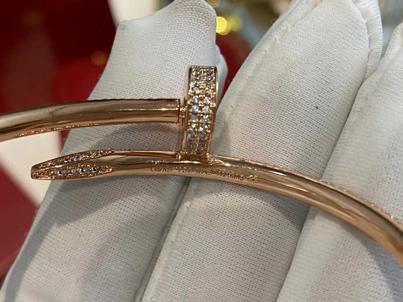 Front view of Cartier unisex jewelry piece