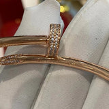 Front view of Cartier unisex jewelry piece
