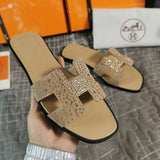 Hermes sandals Style 145 - front view, iconic logo design