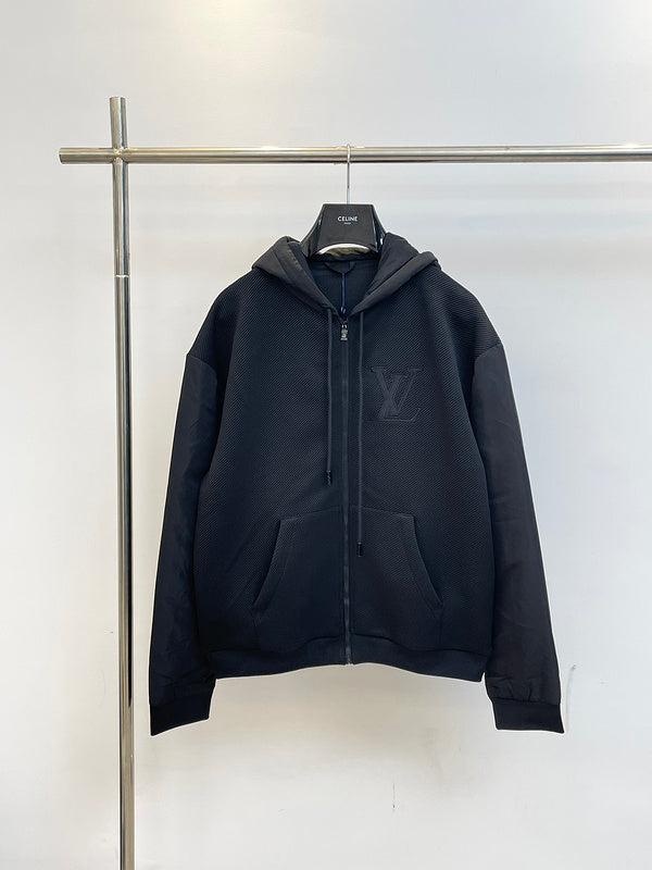 Front view of Louis Vuitton luxury clothing with label-forward styling