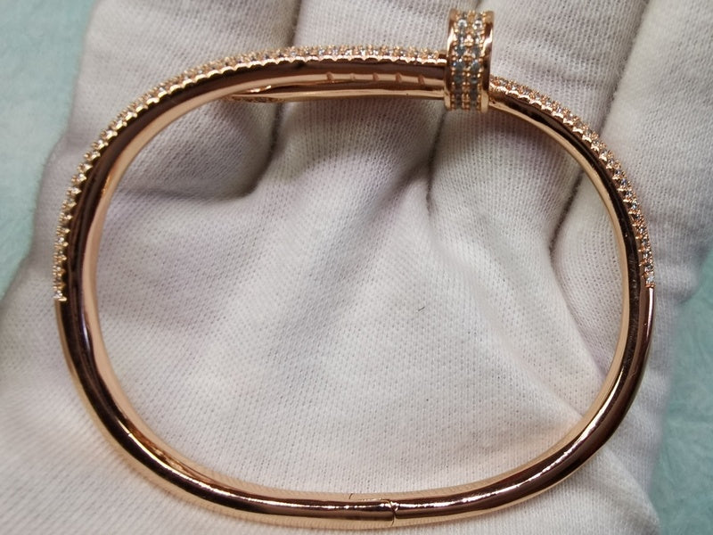 Front view of Cartier unisex jewelry piece