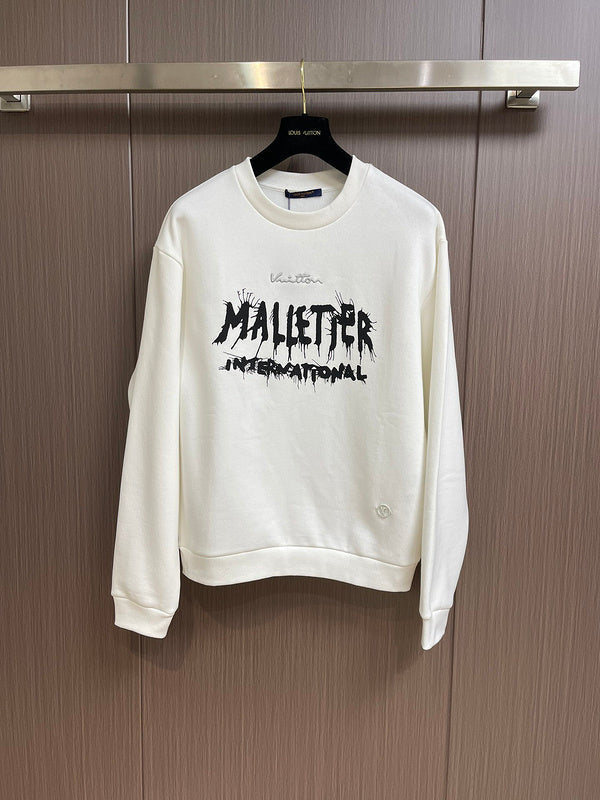 Front view of Louis Vuitton luxury clothing with signature branding
