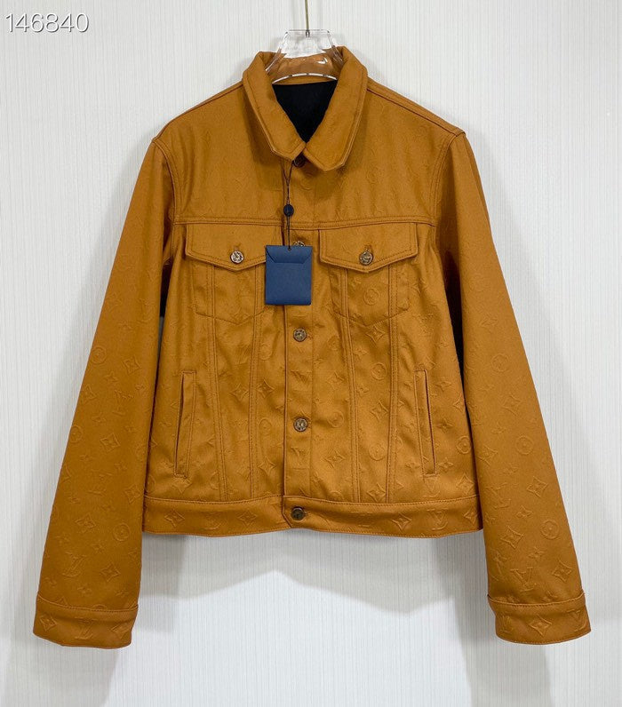 Close-up detail shot of Louis Vuitton luxury clothing with tailored silhouette