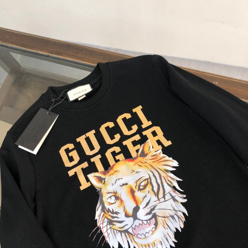Close-up detail shot of Gucci luxury clothing with relaxed-fit cut