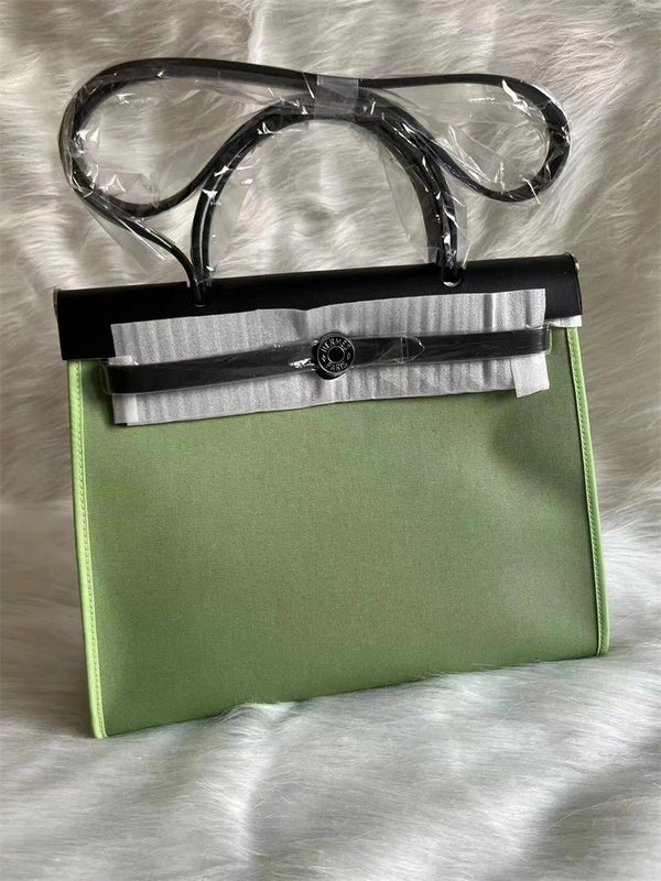 Side view of classic structured handbag