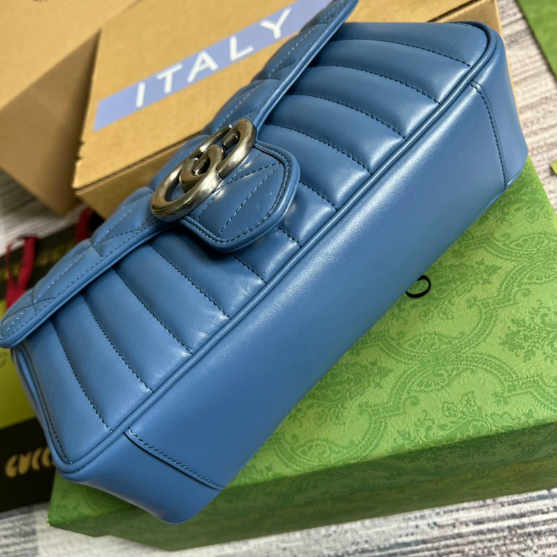 Styled lifestyle shot of statement modern women's handbag – women's luxury handbag