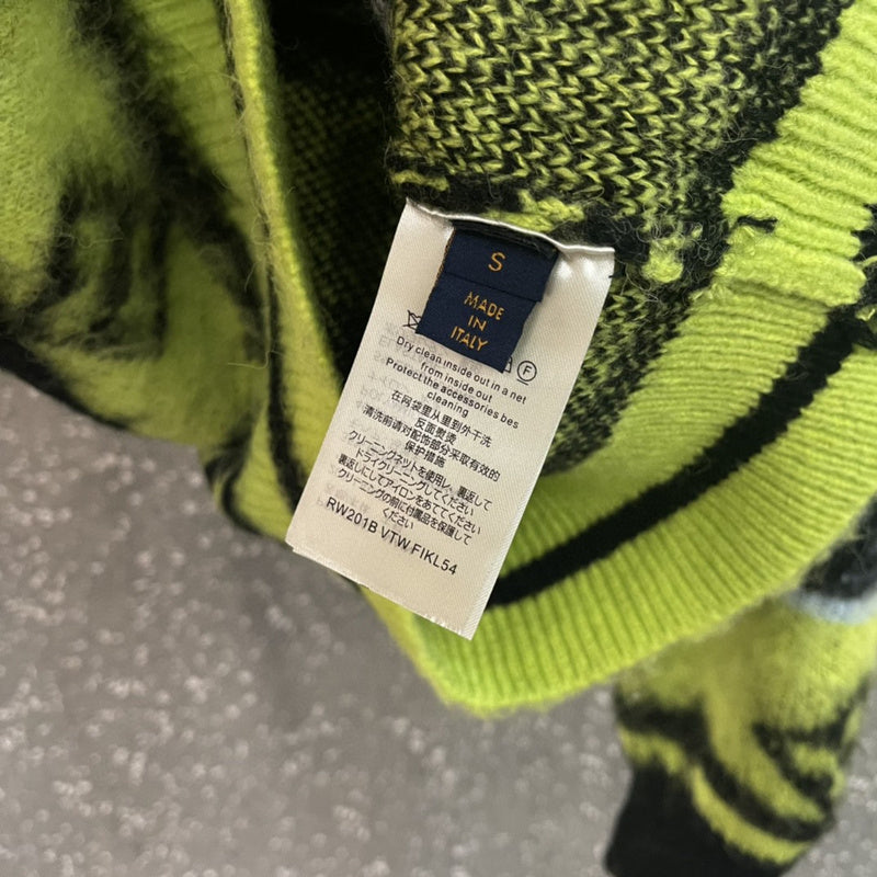 Close-up detail shot of Louis Vuitton luxury clothing with contemporary cut