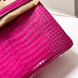 Side view of tailored structured handbag