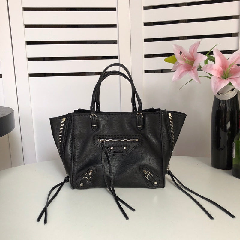 Side profile of polished premium women's handbag – women's everyday handbag