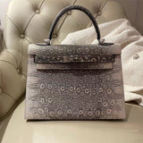  Structured top-handle bag carried on shoulder 10