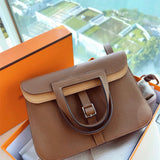  Contemporary satchel carried on shoulder