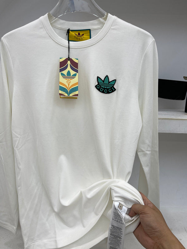 Back view of Gucci luxury clothing with logo-detail design