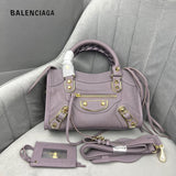 Zivas Charm Classic Sensibility Statement Handbag (Signature Shape & Finish) – Angled View