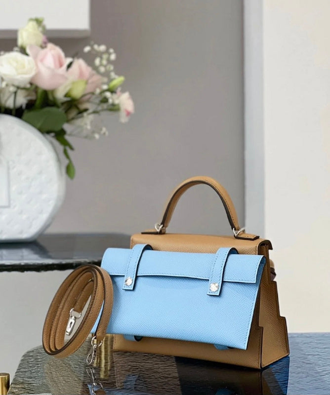  streamlined top-handle bag styled with outfit 12