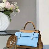  streamlined top-handle bag styled with outfit 12