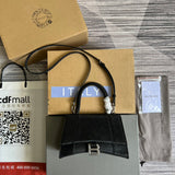 Side profile of classic signature women's handbag – women's designer-style accessory