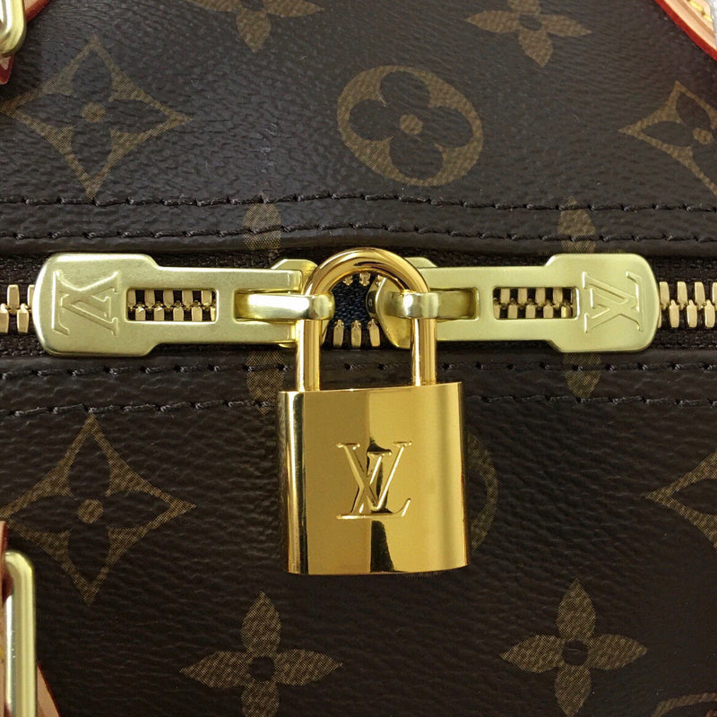 Back view of signature statement women's handbag – women's luxury accessory