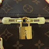 Back view of signature statement women's handbag – women's luxury accessory
