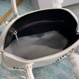 Chic Vegan Leather Handbag - Polished Finish | Women's Fashion Handbag #659 - texture close-up (image 9) of designer-inspired handbag