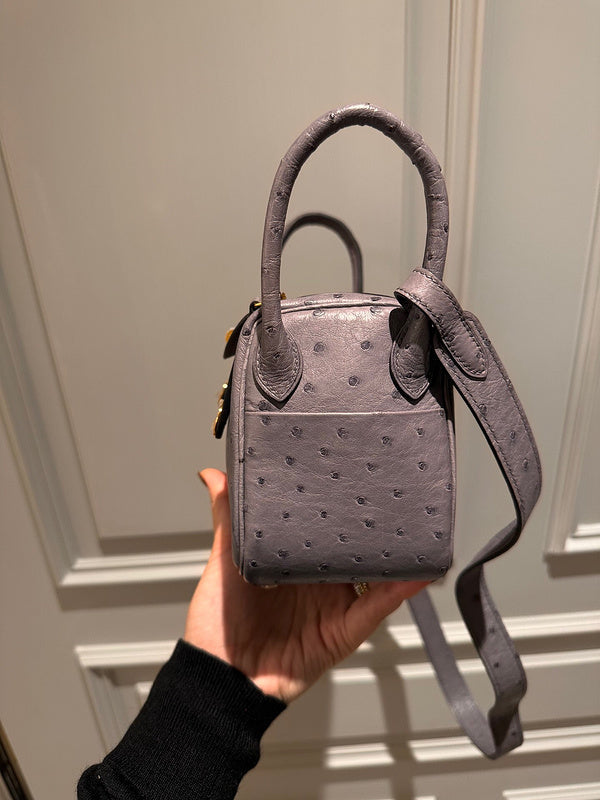 Side view of considered structured handbag