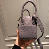 Side view of considered structured handbag