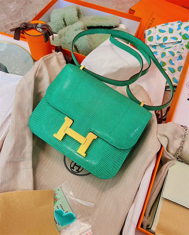 Understated shopper bag carried on shoulder 28