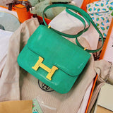  Understated shopper bag carried on shoulder 28