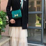 Polished bag shown from front angle