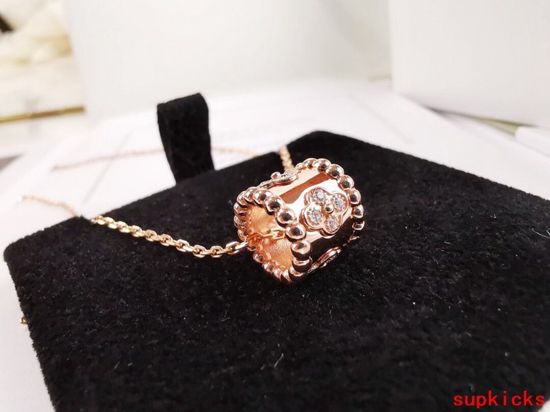 Close-up detail view of Van Cleef & Arpels unisex jewelry piece
