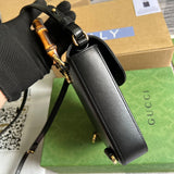 Handle and strap detail of sleek signature women's handbag – women's luxury accessory