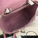 Handle and strap detail of modern polished women's handbag – women's luxury accessory