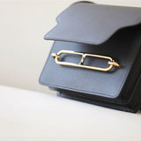 contemporary crossbody bag styled with outfit