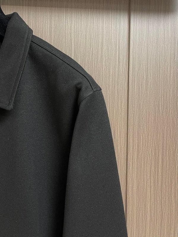 Full styled look of Louis Vuitton luxury clothing with signature branding