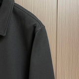 Full styled look of Louis Vuitton luxury clothing with signature branding
