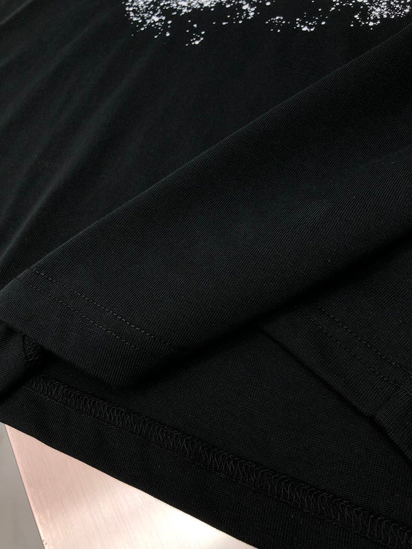 Flat lay presentation of Givenchy luxury clothing with contemporary cut
