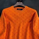 Full styled look of Louis Vuitton luxury clothing with monogram-inspired silhouette